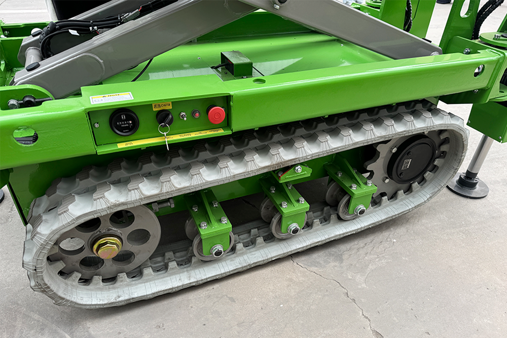 Crawler type scissor lift on rough terrain